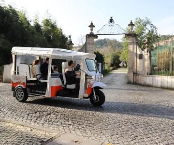 Coimbra: TukTuk adventure. Local and multilingual host. Hotel pick-up