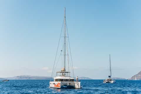 Santorini: Luxury Small Group Catamaran w/ Meal & Open Bar