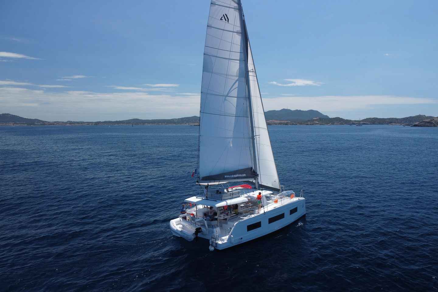 Departure from BRUSC sunset on sailing catamaran