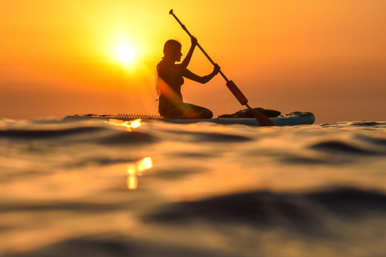 See the Sunrise in Copacabana from a Stand Up Paddleboard with Photos