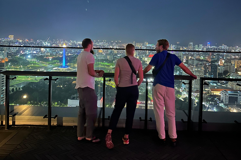 Jakarta: avondwandeltour met snacks en dinerJakarta: nachtelijke wandeltour met snacks en diner