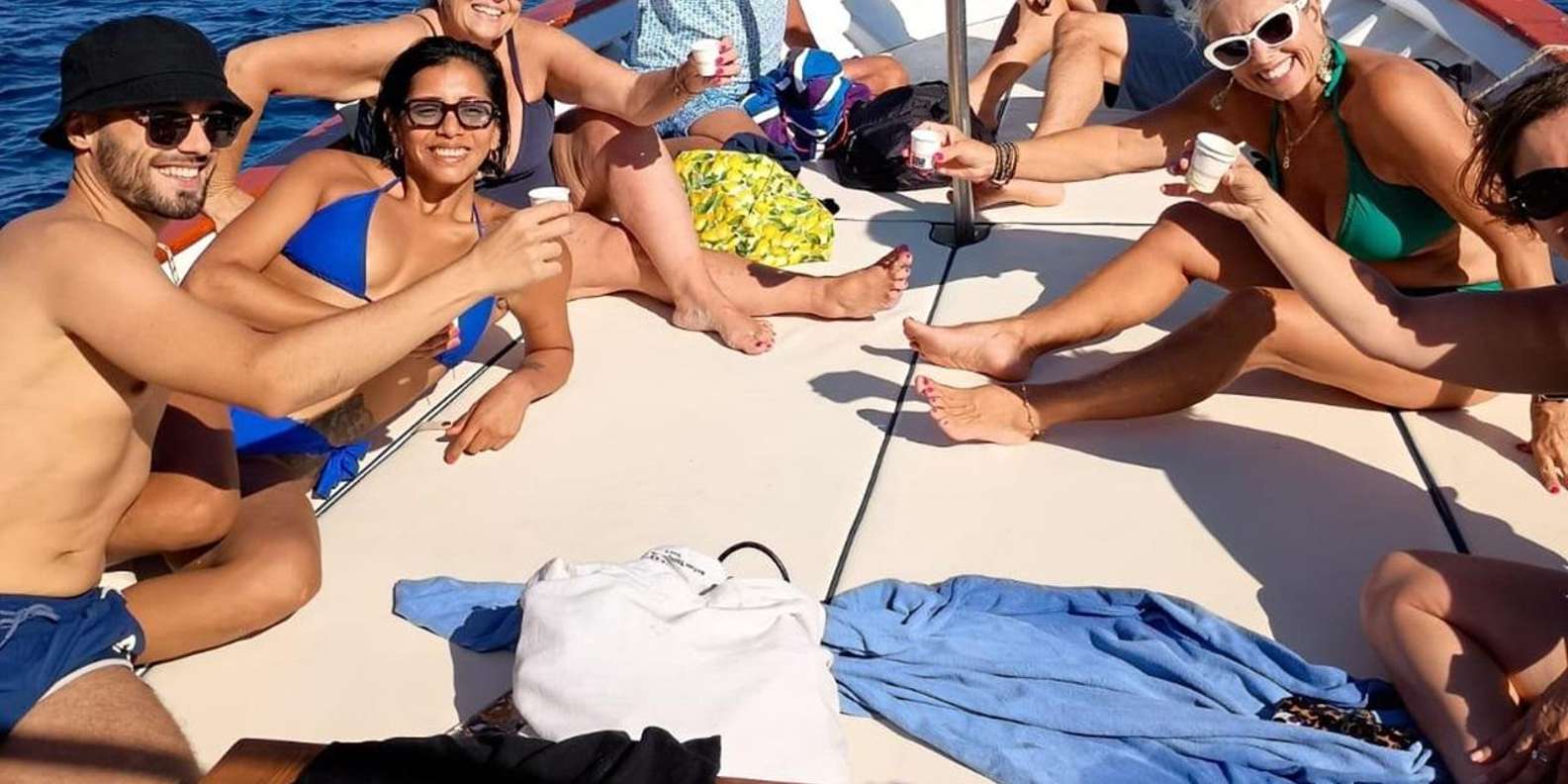 Capri Boat Experience: Faraglioni, Caves, Swim, Limoncello — image 1