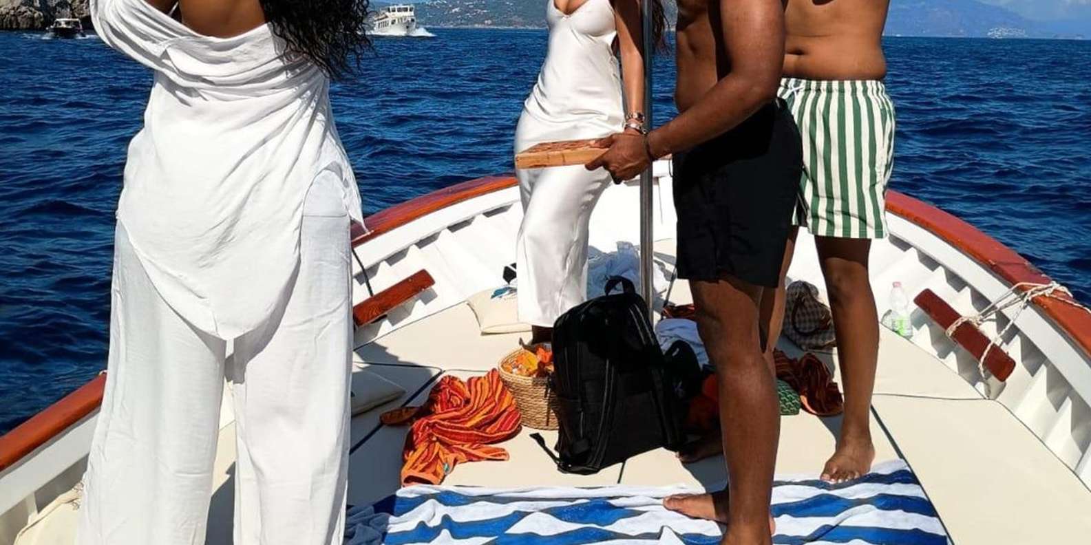 Capri Boat Experience: Faraglioni, Caves, Swim, Limoncello — image 9
