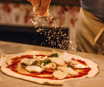 Palermo: clase de pizza y tiramisú con vino de calidad ilimitado