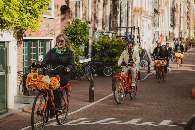 Amsterdam: Top Highlights Guided Bike Tour EN/DE/ES/FR/IT/CN Bike Tour with Guide & Audio Guide in DE, ES, FR, IT, and CN