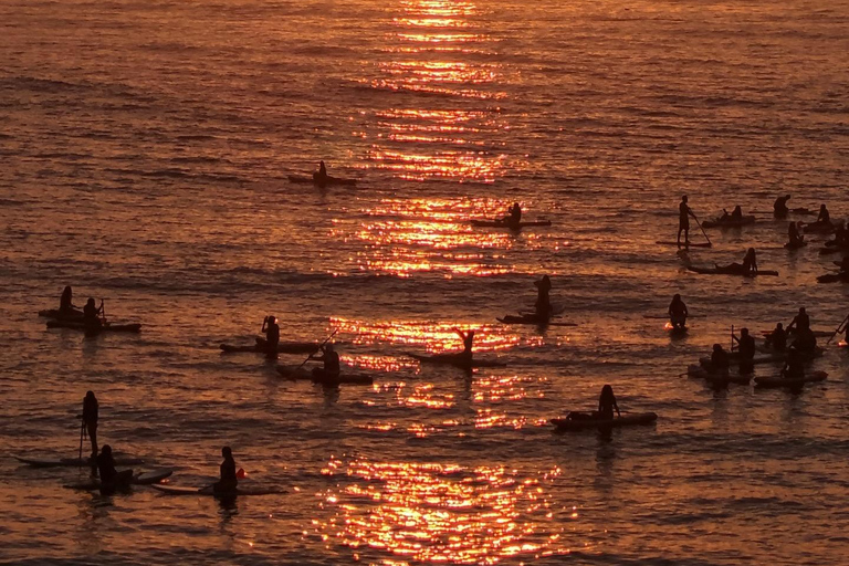 See the Sunrise in Copacabana from a Stand Up Paddleboard with Photos