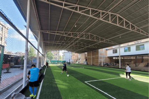 Local Football Game with Young Nepali Youths