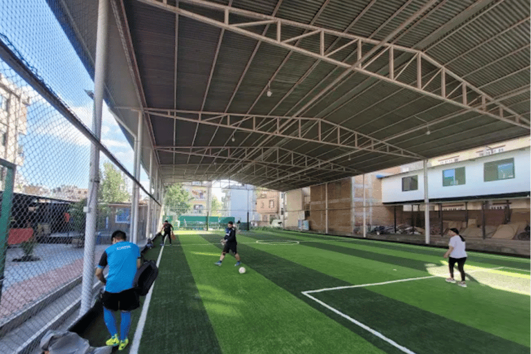 Local Football Game with Young Nepali Youths