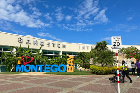 Montego Bay: Airport Transfer with City Tour and Food Stop Montego Bay Hotels: Round-trip Airport Transfer