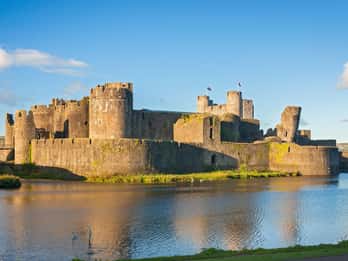 From Cardiff: Three Castles, Welsh Mountains & More Day Tour
