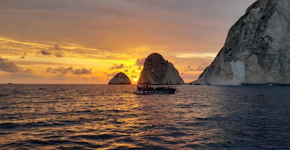 Zakynthos: Sunset Cruise to Myzithres with Wine & transfer