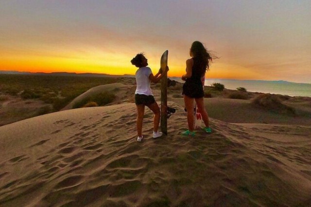 Visit La Paz Sunset Sandboarding at La Paz Dunes Tour in La Paz