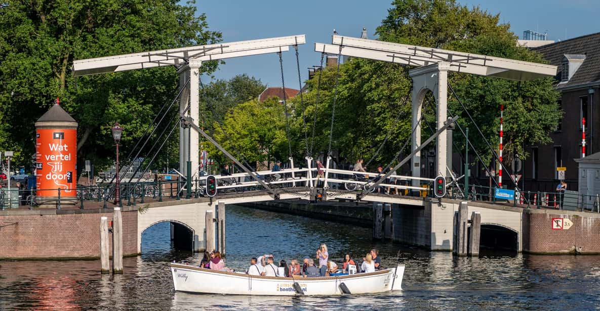 Afbeelding 6 van Amsterdam: Grachtenrondvaart met gids in een open boot langs hoogtepunten