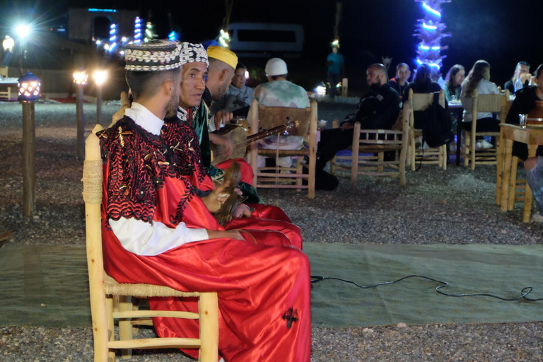 Magical dinner in agafay desert & camel ride with fire show