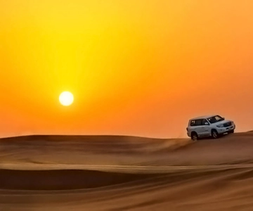 Qatar: Sunset Desert Safari with Camel Ride & Sandboarding