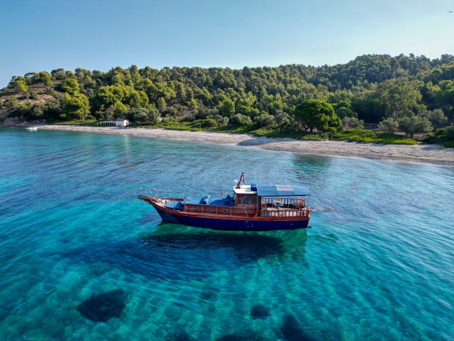 Visit Skiathos Traditional Boat Cruise with Swim Stops & Lunch in Skiathos