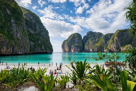 From Phi Phi: Iconic Bays by Longtail—Beach, Lagoon, Snorkel Phi Phi: Longtail Join Trip — Bays, Beach & Snorkeling