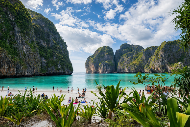 From Phi Phi: Iconic Bays by Longtail—Beach, Lagoon, Snorkel Phi Phi: Longtail Join Trip — Bays, Beach & Snorkeling