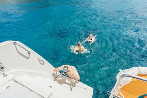 Santorini: Luxury Small Group Catamaran w/ Meal & Open Bar