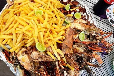 Zanzibar: snorkeling all'Atollo di Mnemba, tour del villaggio e di Stone TownZanzibar: snorkeling all'Atollo di Mnemba, villaggio e Città di Pietra