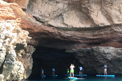 Paddelsurf i solnedgången, grottor, snorkling och cava