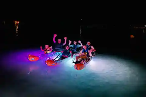 Rab: Night adventures illuminated transparent kayaks