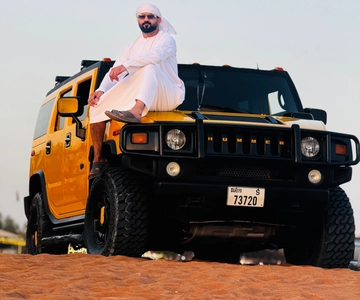 Dubai: Evening Hummer luxurious Desert Tour with photoshoot.