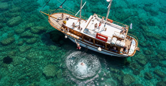 Hersonissos: Traditional Wooden Boat Trip, Swim Stops & Lunch