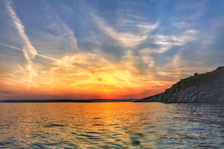 Sonnenuntergang Wild Bays Private Bootsfahrt mit Bobo