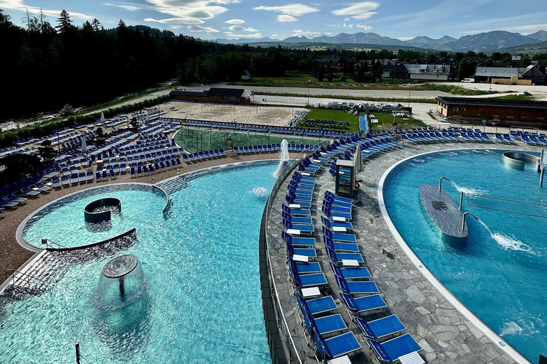 Zakopane: Paseo en moto de nieve con piscinas termales y servicio de recogida del hotel