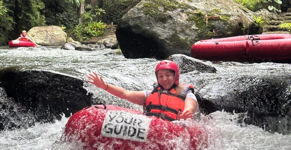 Bali: Downhill Cycling, River Tubing & Waterfall Day Trip