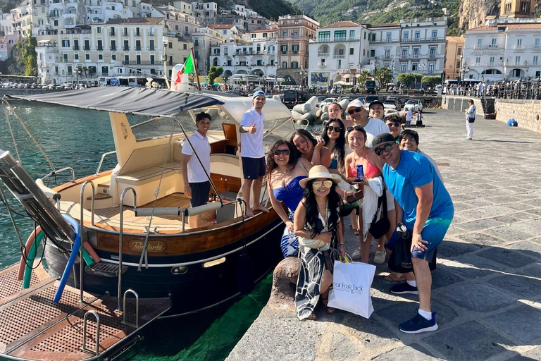 Capri Boat Tour with Caves, Swimming, Aperitif and Champagne From Capri: PRIVATE Capri Boat Tour