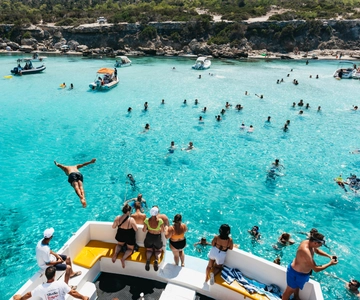 Paphos: Blue Lagoon Bus Transfer and Water Slide Boat Cruise
