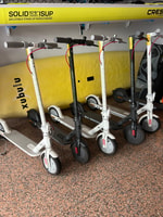 Armação de Pêra on an electric scooter - Housity
