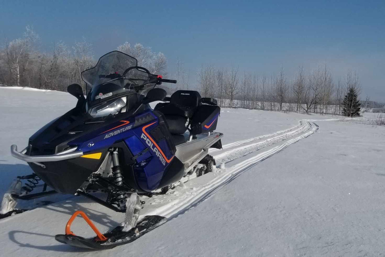 Ciudad de Quebec: Excursión guiada en moto de nieve1,5 horas de alquiler guiado de moto de nieve