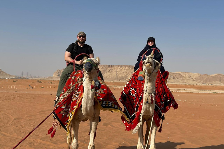 Riyadh:Red Sand Dunes camel ride&Quad&Sandboarding Adventure Private Tour with pick up and drop off from your location