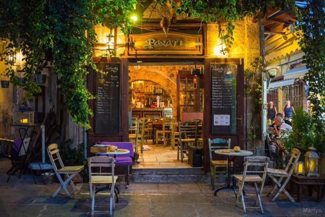 Visit Night Rhodes old town Gastro e-bike tour with drink & meze in Rhodes, Greece