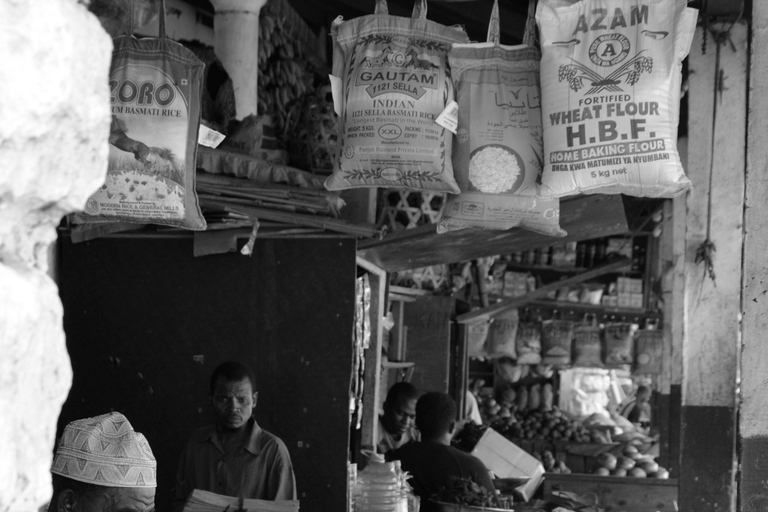 Street food market walking tour in Stone town with transfer