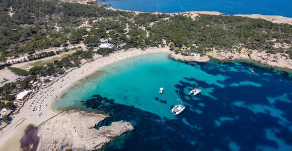 From Sant Antoni: Round-trip boat transfer to Cala Conta or Cala Bassa