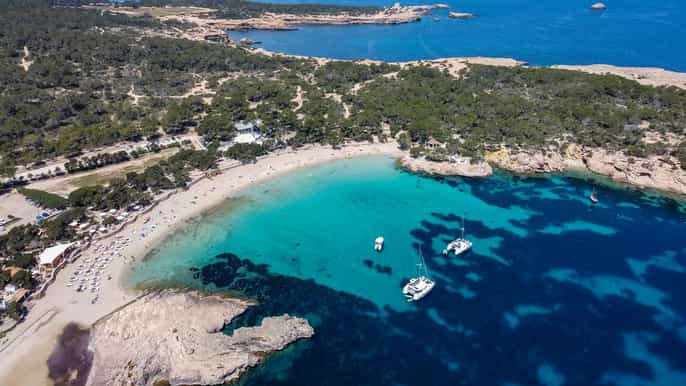 From Sant Antoni: round trip by boat to Cala Conta or Cala Bassa