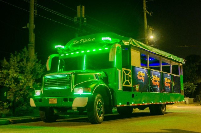 Visit Cartagena City Highlights Chiva Party Bus Tour at Night in Isla Barú