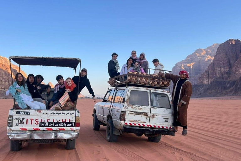 overnight: sleep under the stars in the cave in Wadi Rum Protected Area Caml tour