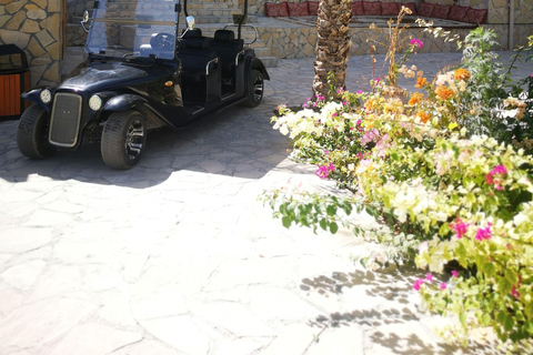 Passeio de carrinho cultural pela vila de Al Aqur