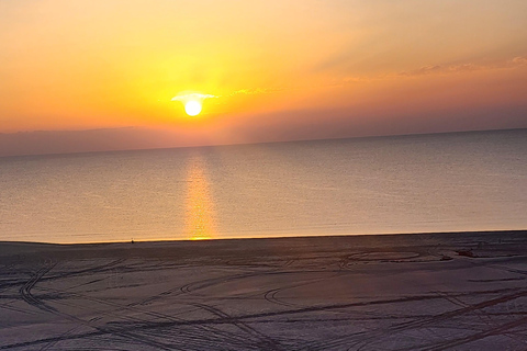 Sunrise or Sunset desert Safari with Sandboarding in Qatar