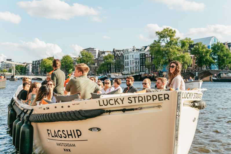 Amsterdam: Open Boat Canal Cruise with Onboard Bar | GetYourGuide
