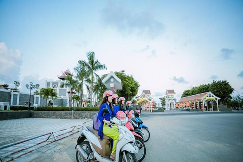Tour serale della città di DaNang con scooter e Han CruiseTour serale della città di DaNang in scooter - Cavaliere di Aodai e crociera di Han