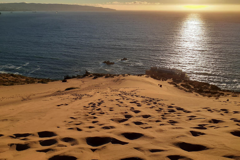 Sandboarding and sunset in Concon Sand dunes Sunset in Concon Sand dunes