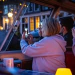 Amsterdam: crociera serale sui canali – Luci della città e opzione con vino