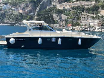 Amalfikusten: båttur - Positano utsikt över Capri