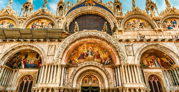 Sunlit mosaics and marble arches inside St Mark’s Basilica